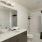 a bathroom with a shower and toilet