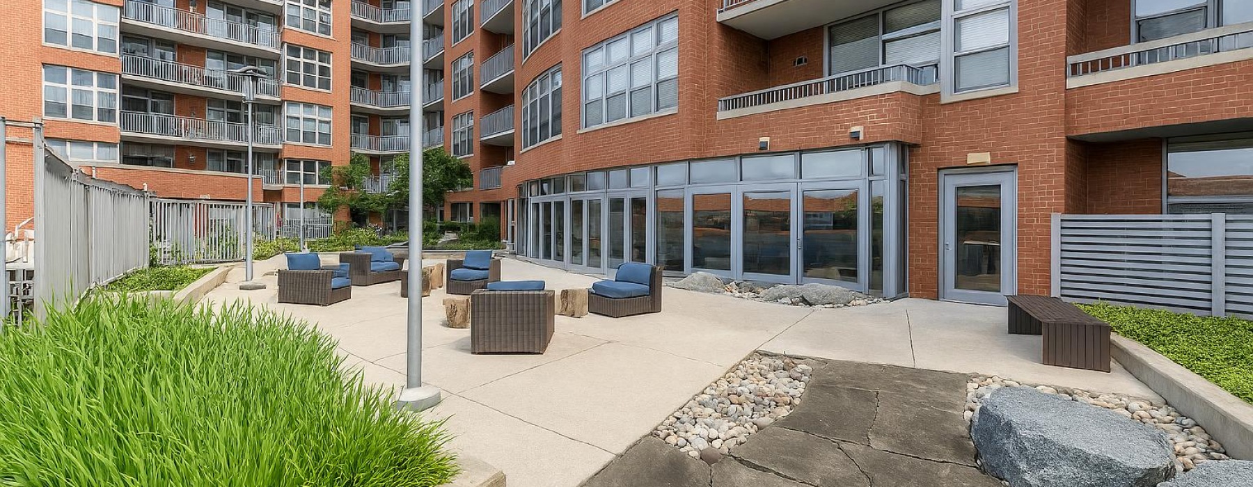 Private Couryard with lush greenery and lounge seating