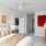 bedroom with bed and wall art