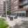 outdoor courtyard with trees and seating